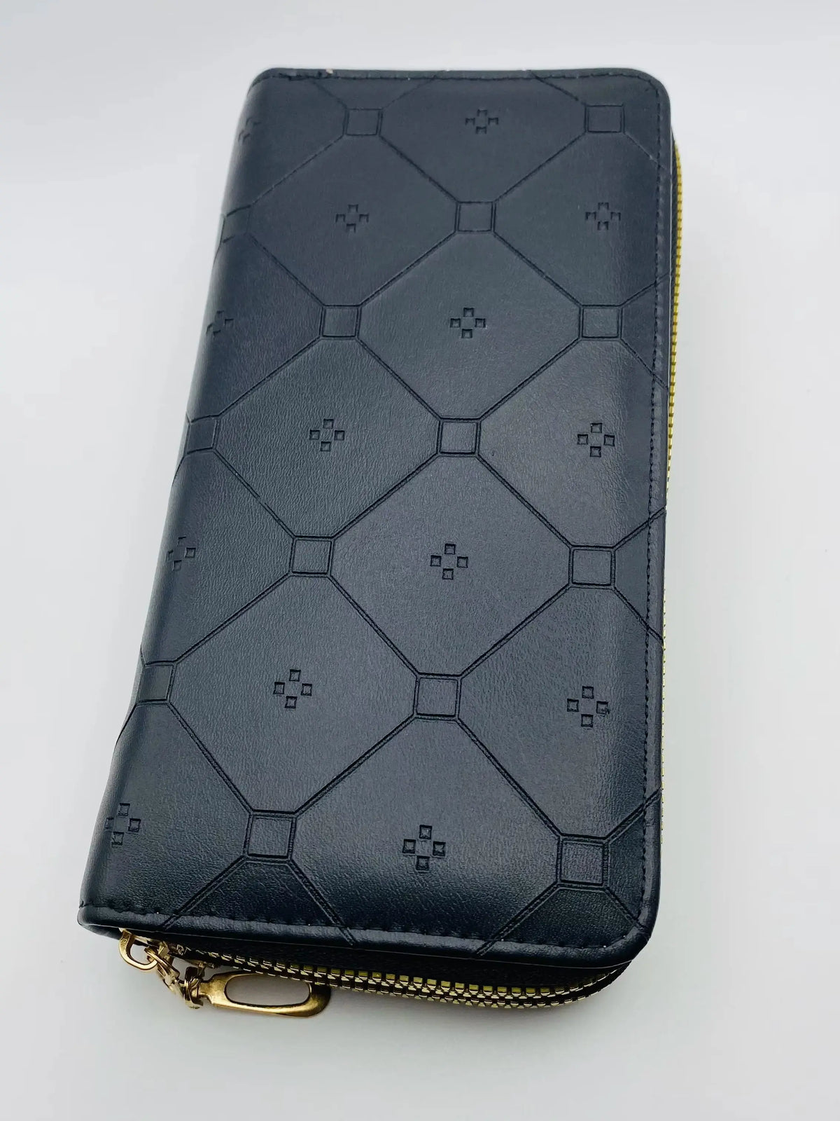Large capacity wallet with double zipper from Corporación Turística, featuring multiple compartments and a sleek design.