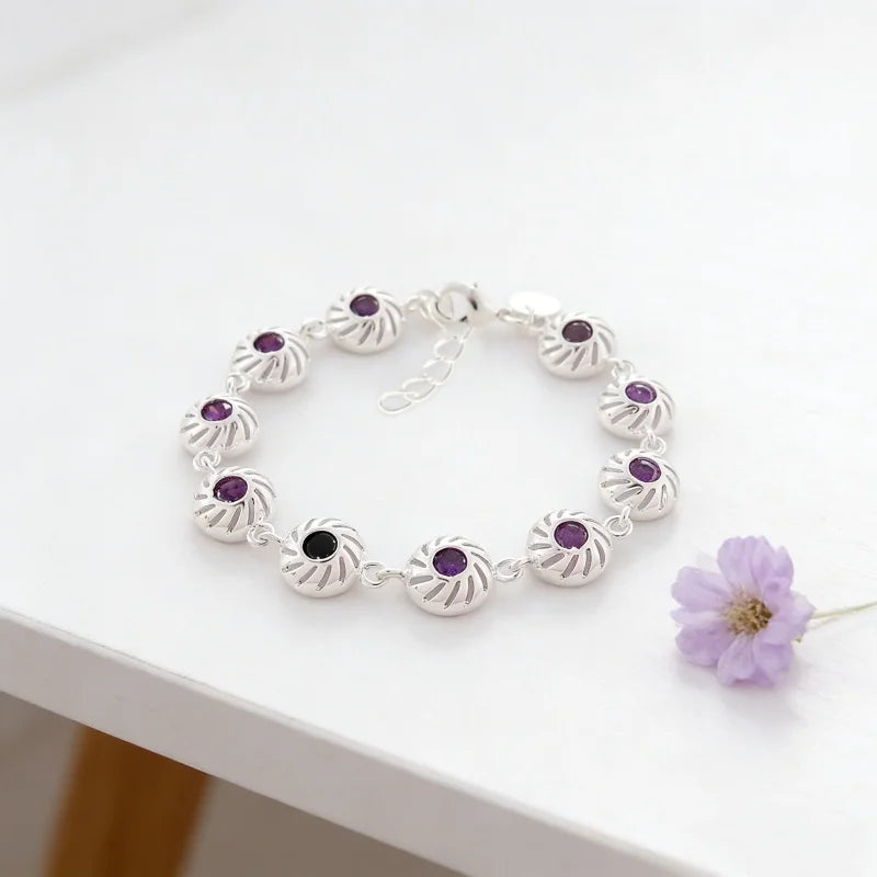 Infinity love bracelet for women by Corporación Turística, featuring a silver-plated design with heart accents.