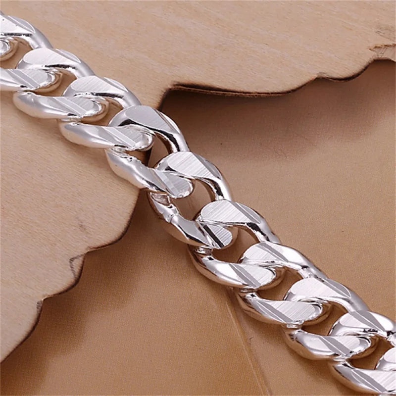 Silver 925 bracelet for men and women, fine and elegant jewelry piece with a sleek design, showcased on a plain background.