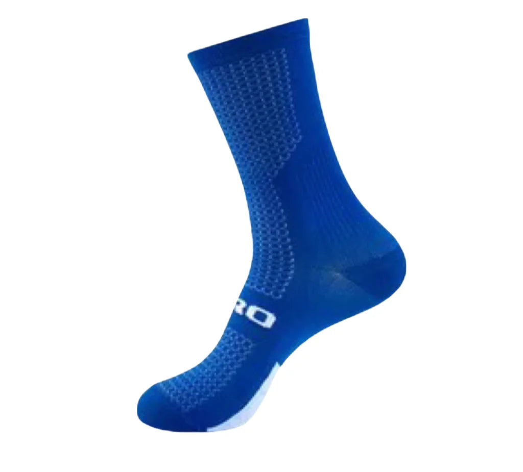 Unisex orange cycling socks from Corporación Turística, breathable and sweat-absorbing for outdoor sports and cycling activities.