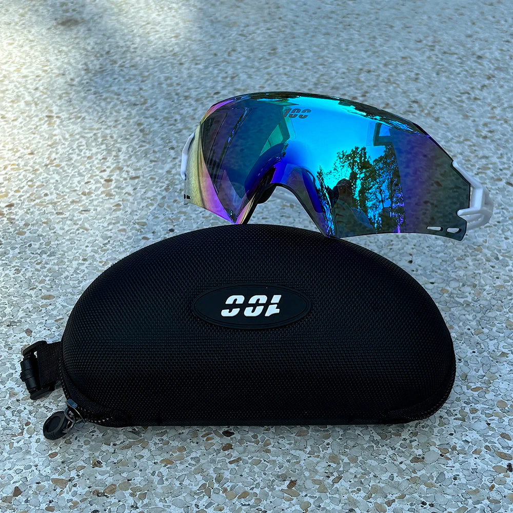 Red UV400 photochromic cycling glasses by Corporación Turística for mountain biking, sport-ready eyewear with polarized lenses.