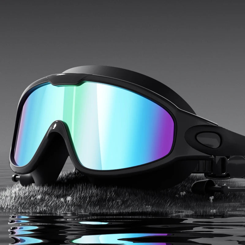 Unisex adult swimming goggles by Corporación Turística with wide view, anti-fog, UV protection, black transparent design.