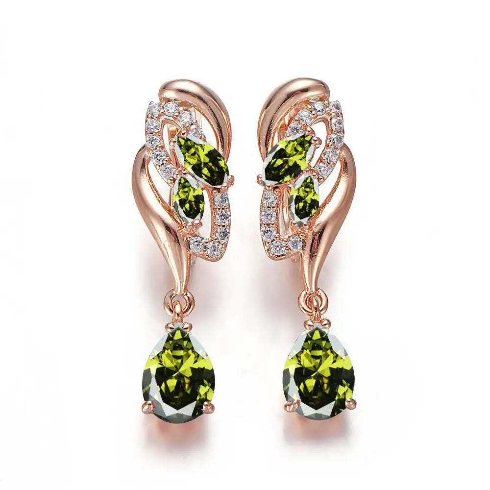 Gold-tone drop earrings with sparkling cubic zirconia stones for women, featuring elegant teardrop design.