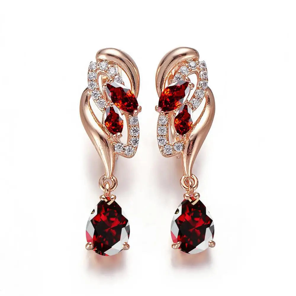 Dangle earrings with cubic zirconia drops, designed for women, featuring sparkling crystal accents and silver-tone hooks.
