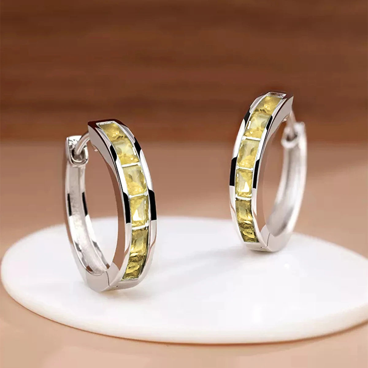 Classic round hoop earrings for women by Corporación Turística, featuring a sleek, timeless design in silver tone.