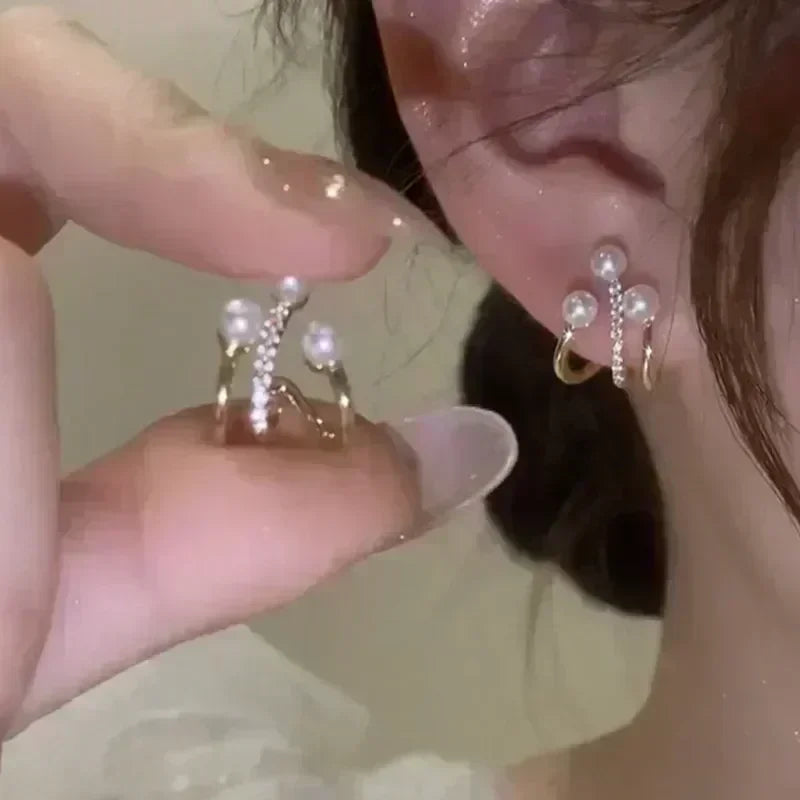 Square crystal zirconia earrings with brown stones from Corporación Turística, showcasing the elegant jewelry design.