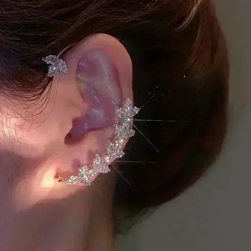 Square crystal zirconia earrings with a warm brown hue from Corporación Turística, featuring sparkling faceted stones.