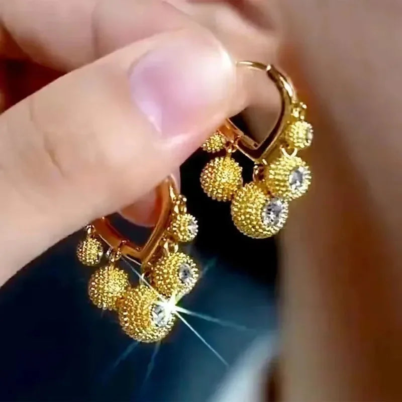 Long crystal drop tassel earrings with bead accents, stylish jewelry accessory from Corporación Turística.