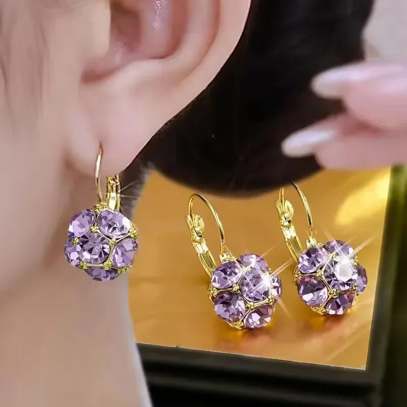 Elegant circular floral earrings featuring intricate flower designs, perfect for stylish accessories.