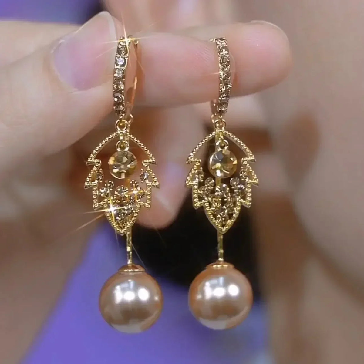 Elegant crystal dangle earrings by Corporación Turística featuring intricate circular crystal pendants, perfect for stylish accessories.