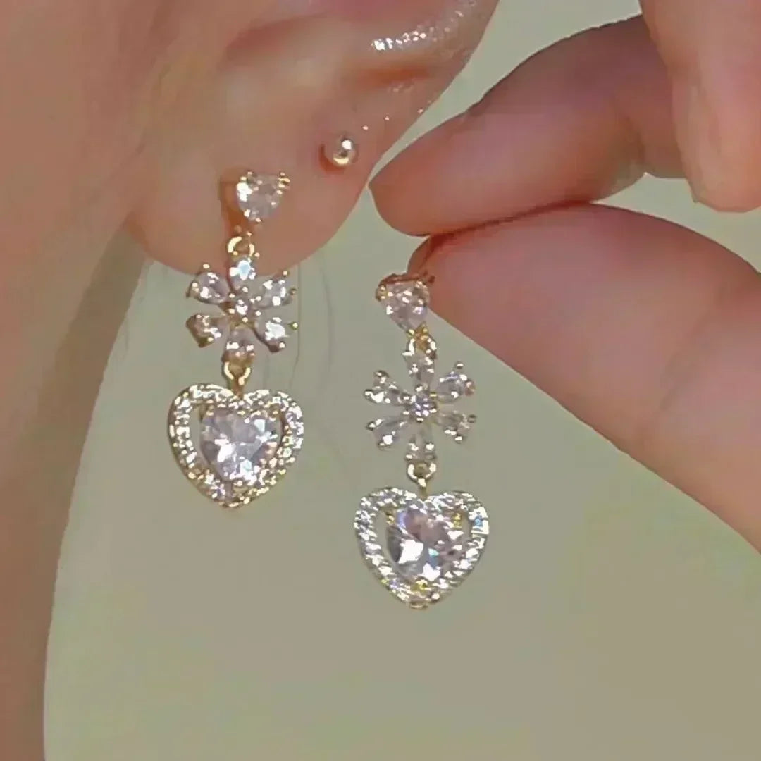Gold leaf crystal earrings for women featuring green crystals, elegant jewelry by Corporación Turística