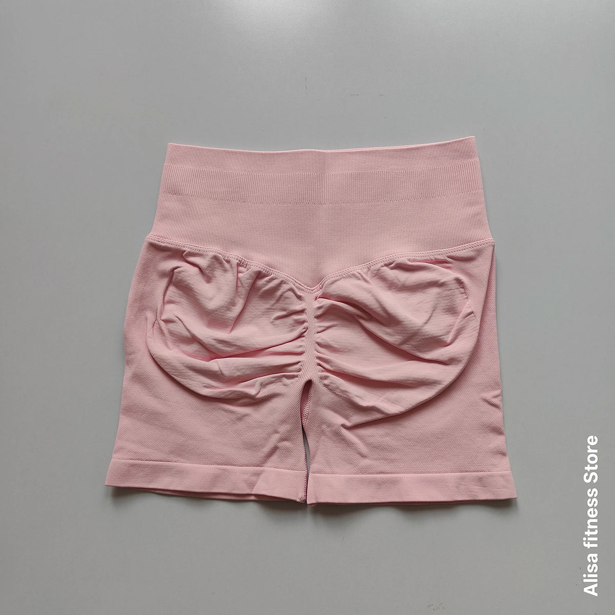 Dark gray high-waist yoga shorts for summer, seamless design from Corporación Turística, suitable for active wear or lounging.