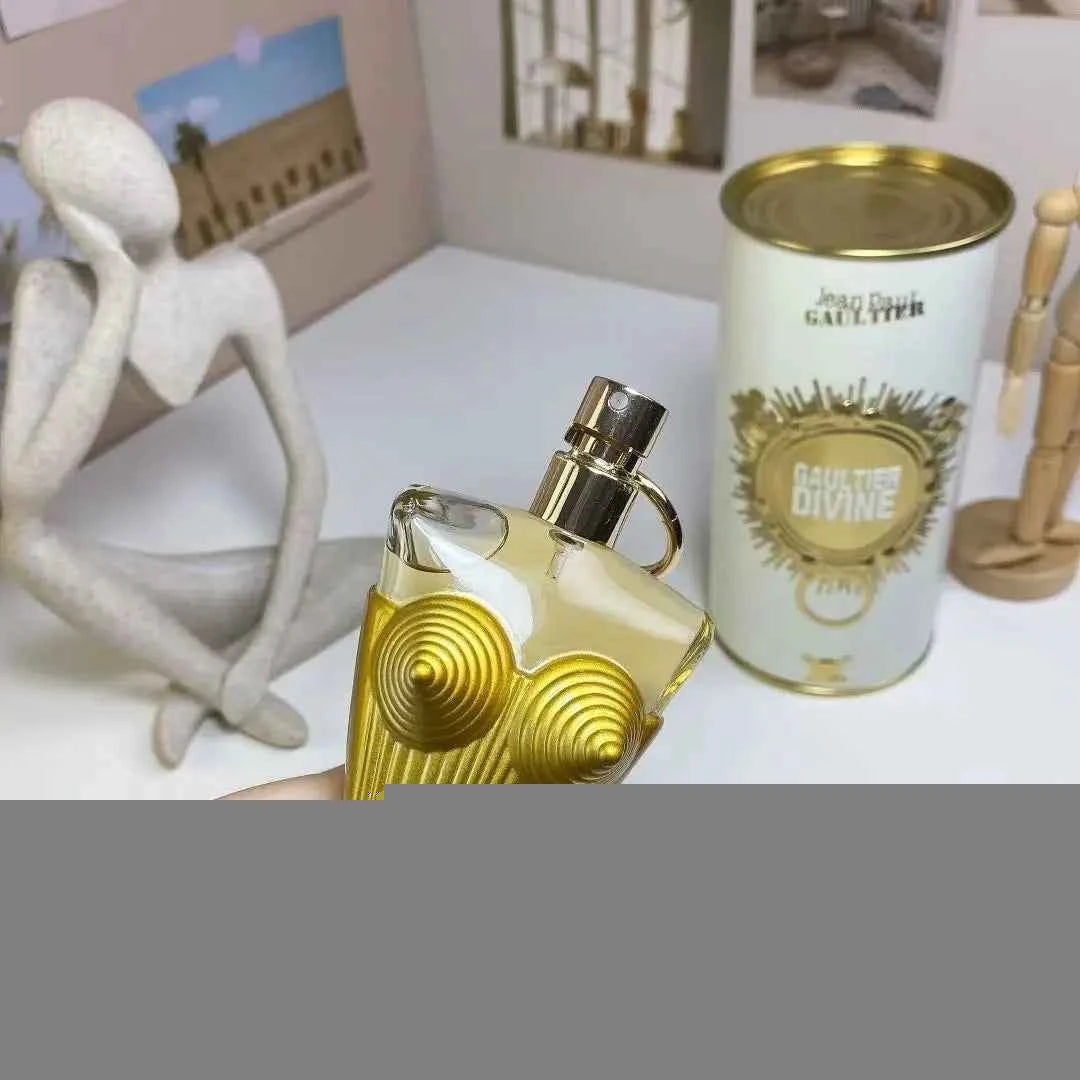Gaultier Divine perfume bottle by Corporación Turística, showcasing the elegant design and bright, floral fragrance details.