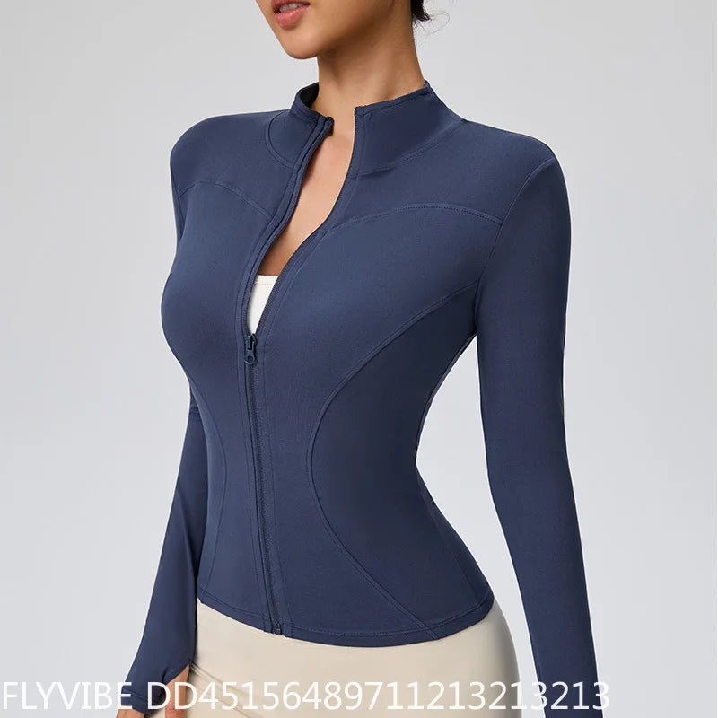 Pink women's quick-dry sports jacket with zipper and hood, ideal for active wear and outdoor activities.