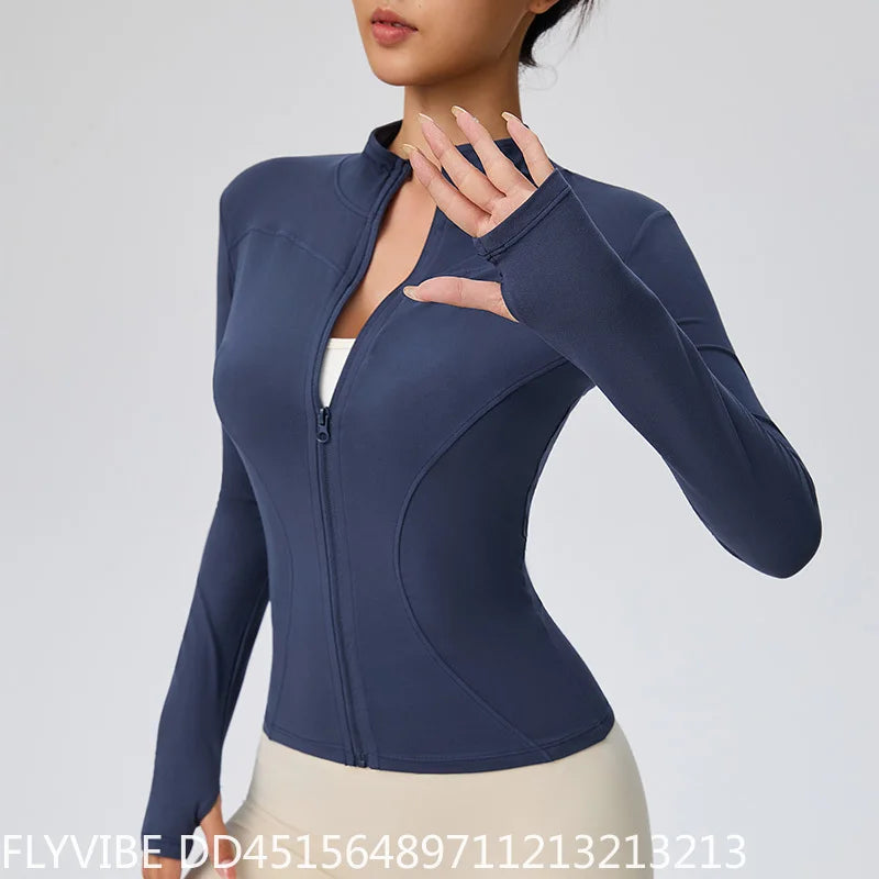 Pink women's quick-dry sports jacket with zipper from Corporación Turística, designed for active outdoor activities.