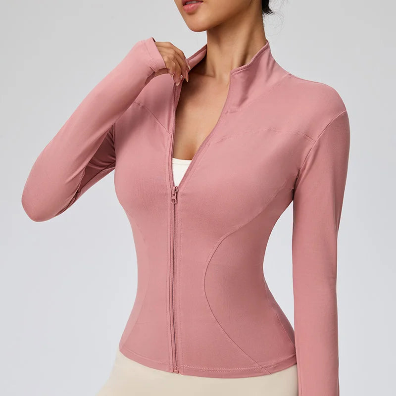 Pink women's quick-dry sports jacket with zipper, ideal for activewear and outdoor activities.
