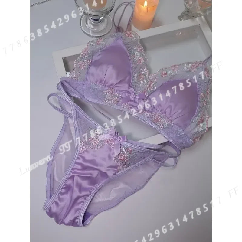 Luxury silk lace lingerie set by Corporación Turística featuring black lace panties and matching top, elegant and delicate design.