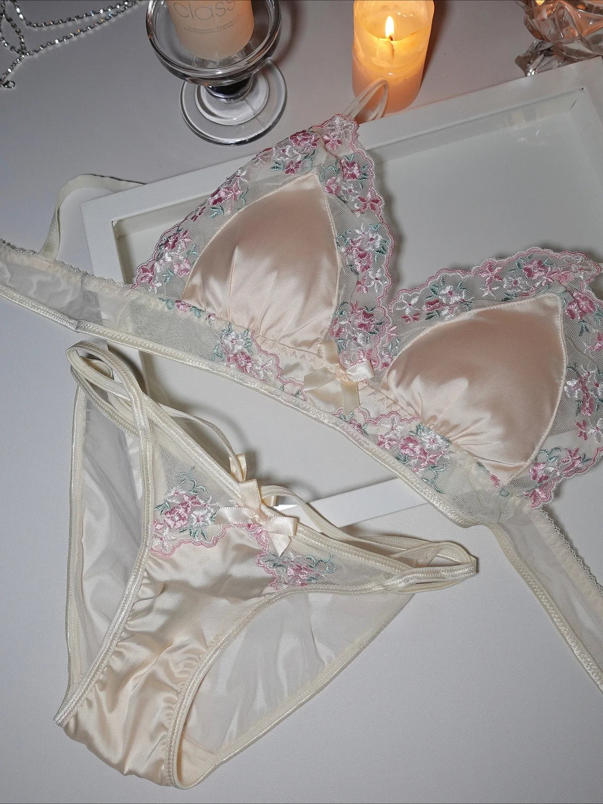 Luxurious lightweight silk lace lingerie set in black from Corporación Turística, featuring delicate lace details and elegant design.