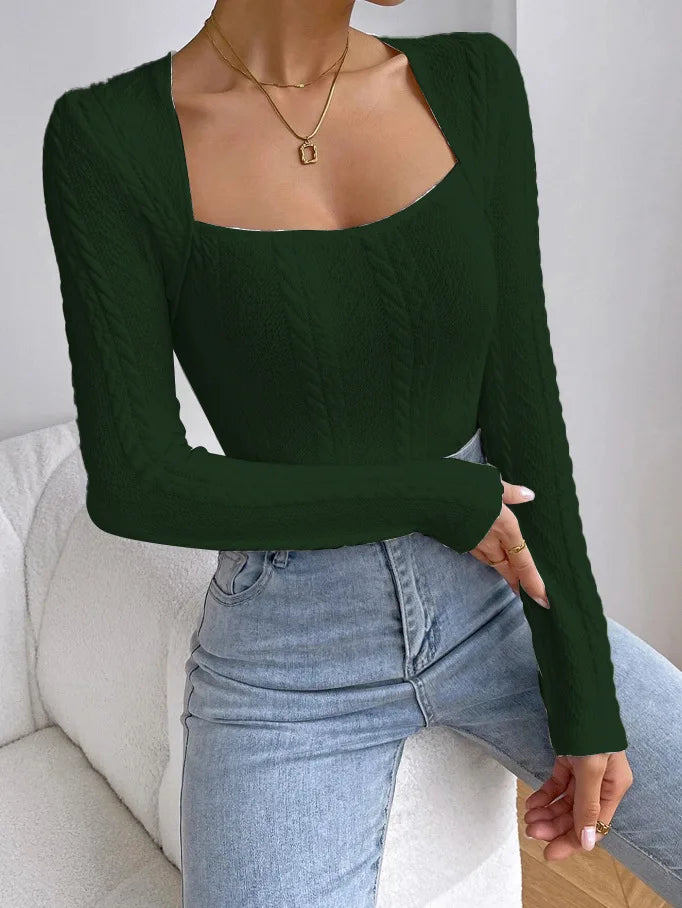 Long-sleeve women's knit bodysuit by Corporación Turística, showcasing a fitted, comfortable one-piece garment.