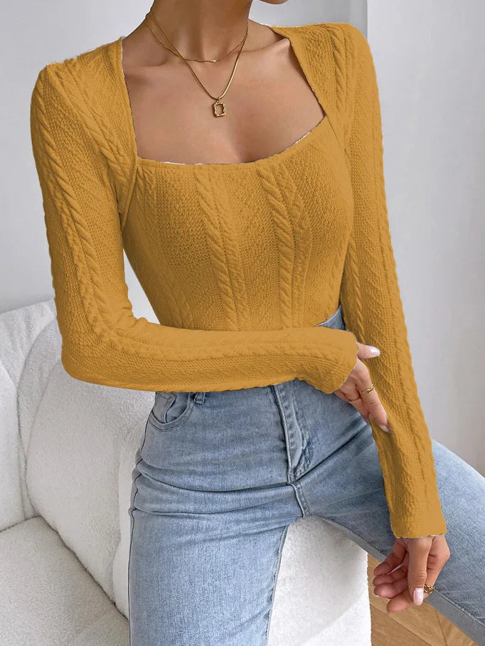 Long-sleeve women's knit jumpsuit from Corporación Turística, featuring a fitted body and stylish design.