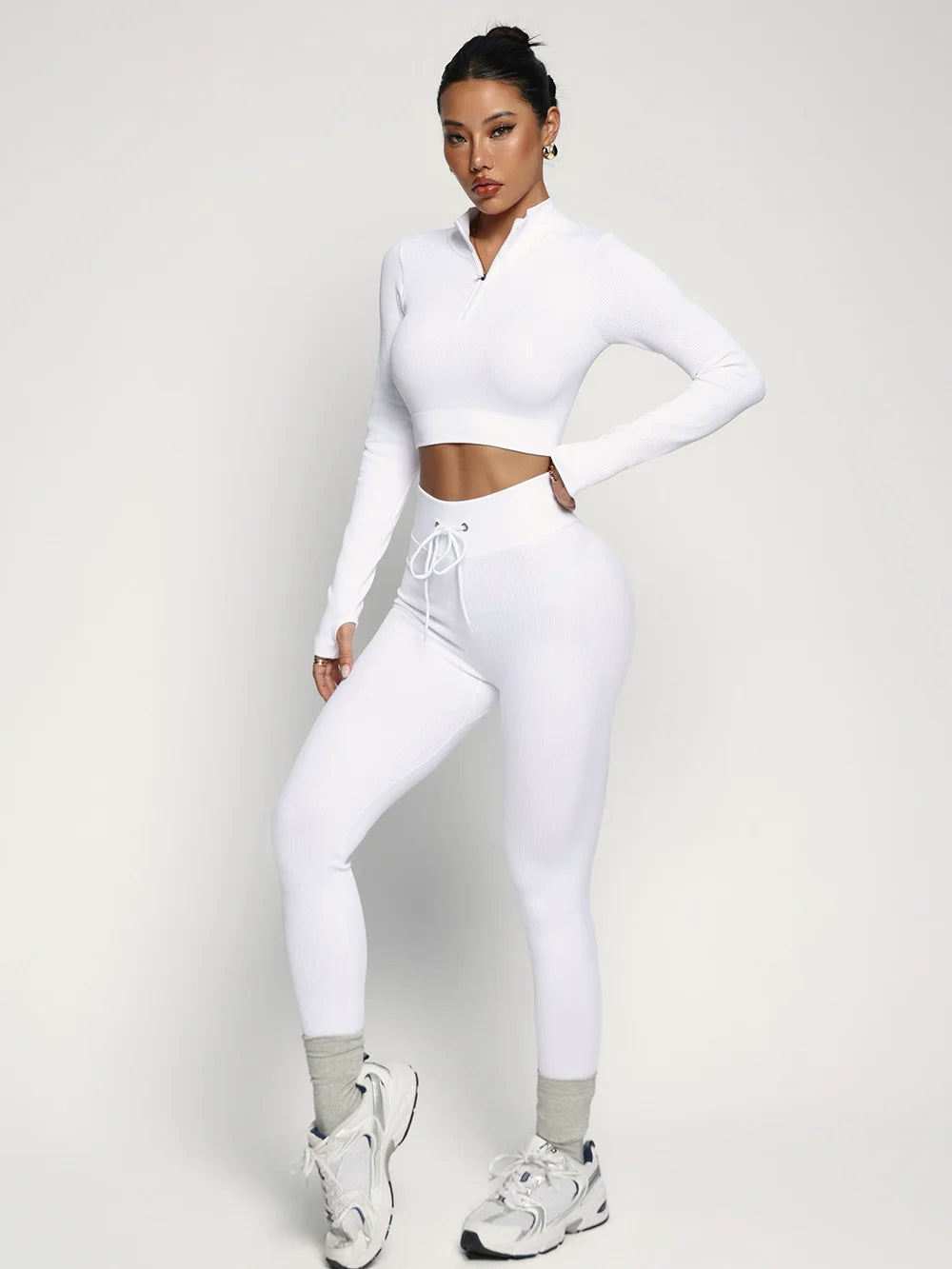 Fashionable two-piece yoga suit by Corporación Turística, sportswear set in black for comfortable exercise and active wear.