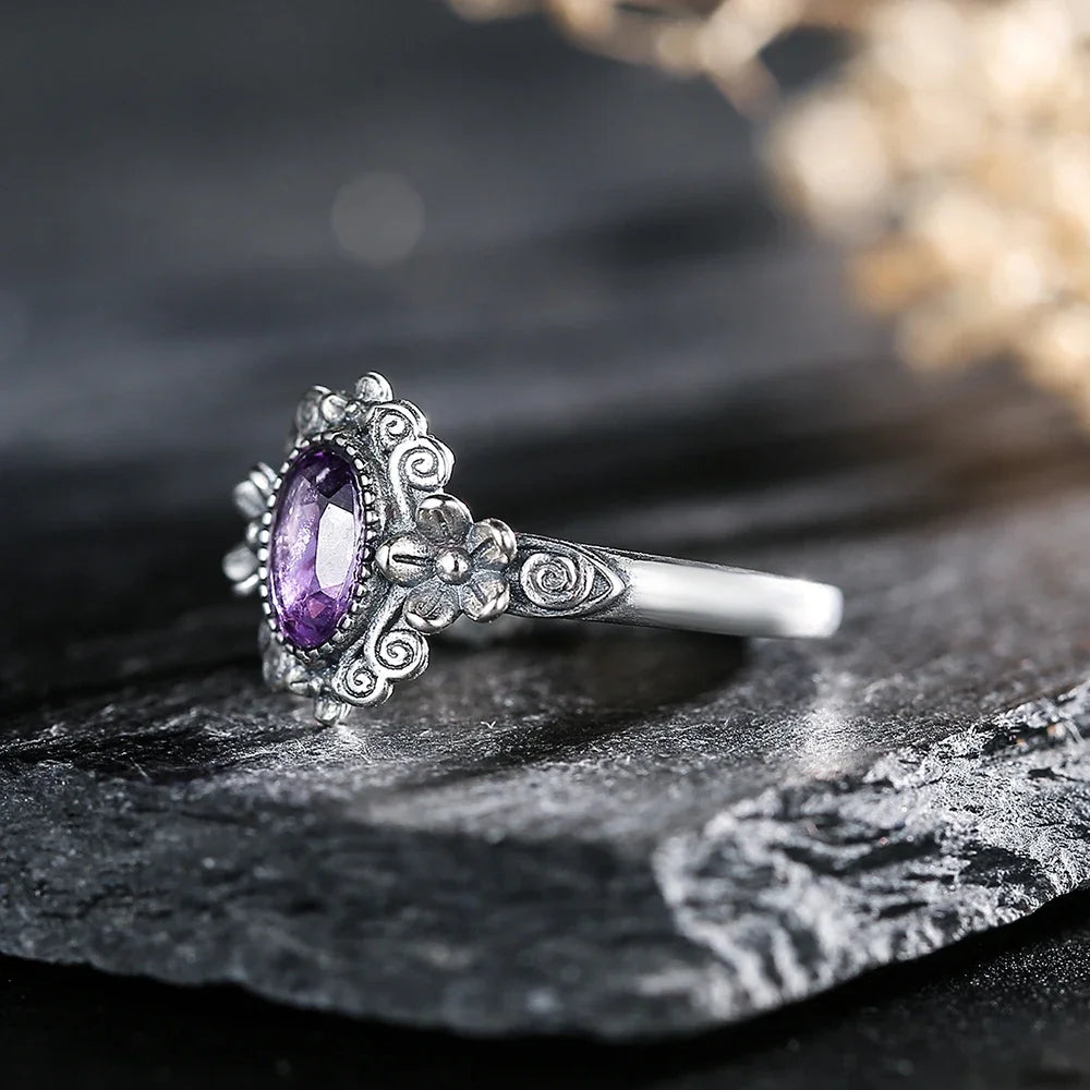 Sterling silver 925 amethyst ring with a 7x5mm purple gemstone, featuring a redimensionable band, by Corporación Turística.
