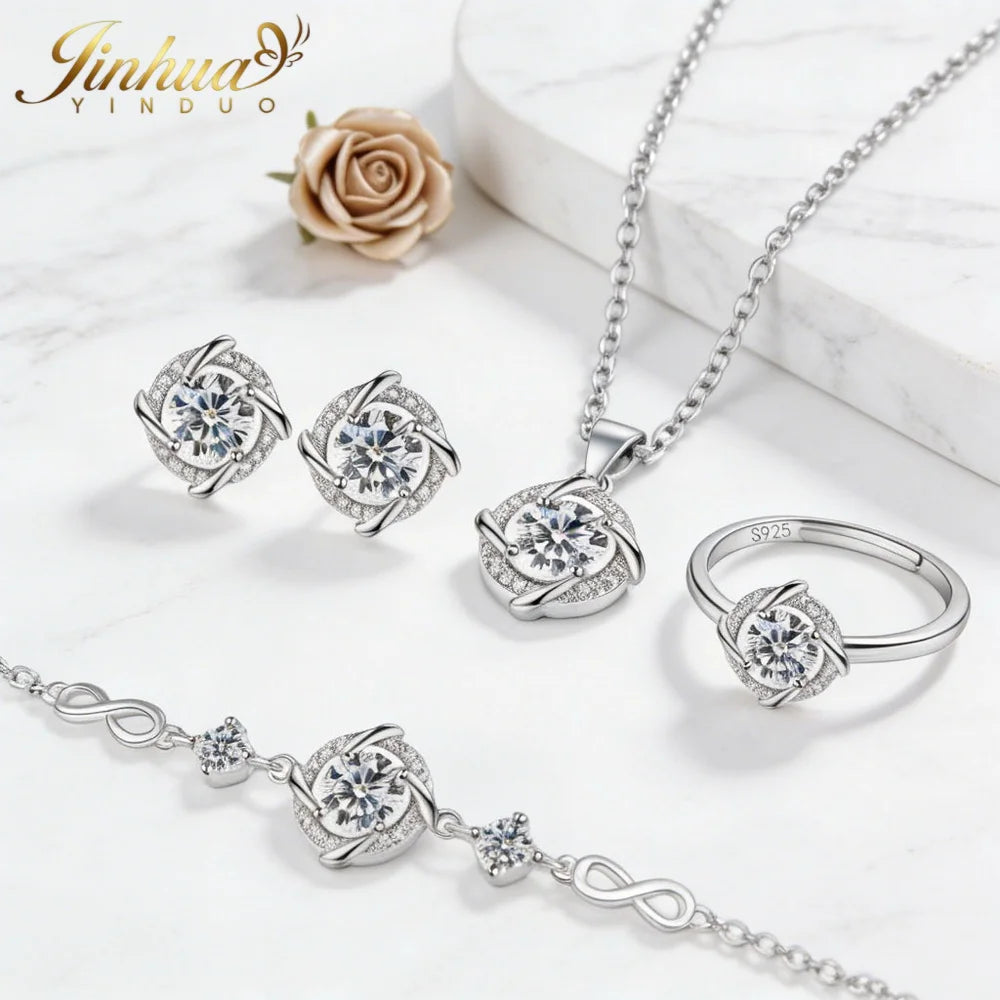 Classic silver jewelry set made of 925 Ley silver featuring blue stones, displayed with a redimensionable gauze bag.