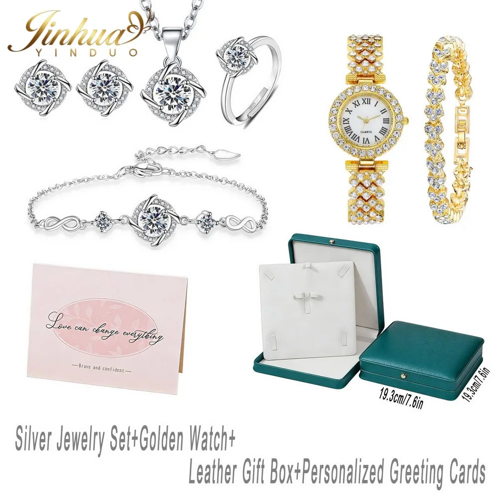 Sterling silver jewelry set with blue stones, featuring classic design by Corporación Turística, displayed with a gauze bag.