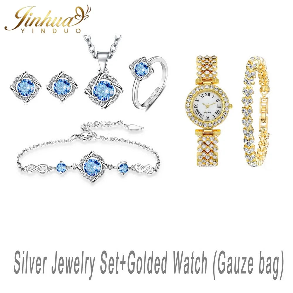 Elegant silver jewelry set made of 925 sterling silver, featuring blue stones, displayed with a redimensionable gauze bag.