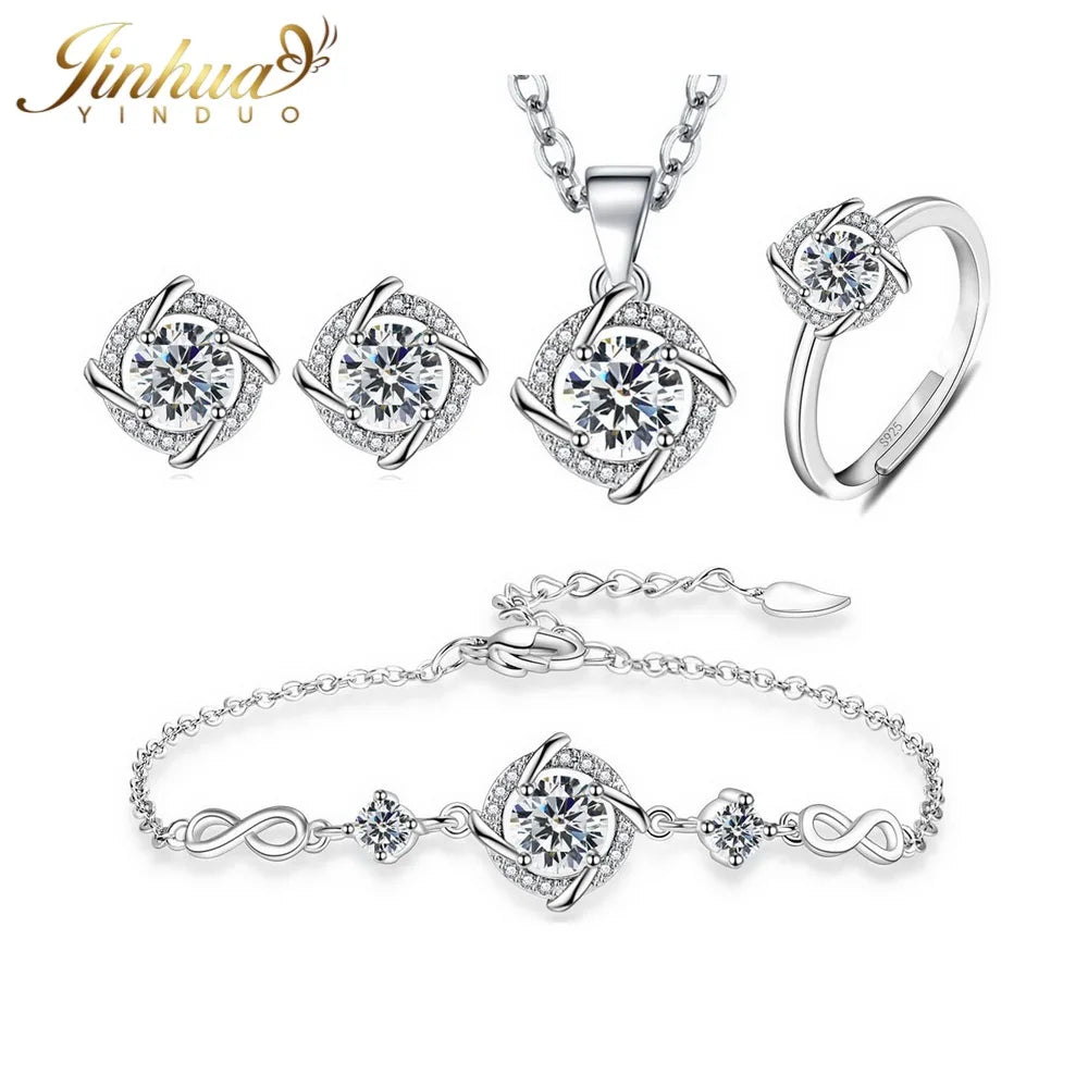 Elegant jewelry set in sterling silver 925 with blue stones, featuring classic design, displayed with a gauze bag.