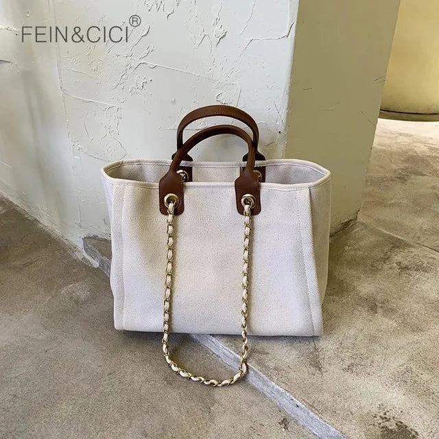 Large genuine leather tote bag for women with canvas body and shoulder strap, stylish and spacious for everyday use