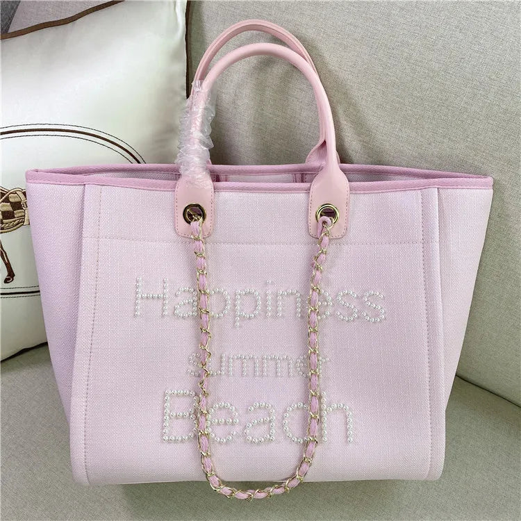 Large women’s canvas shoulder bag with genuine leather accents, stylish and spacious handbag by Corporación Turística.