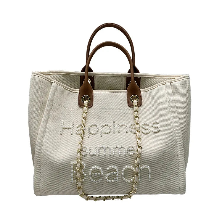 Large genuine leather lona tote bag for women, spacious shoulder bag with durable design by Corporación Turística.