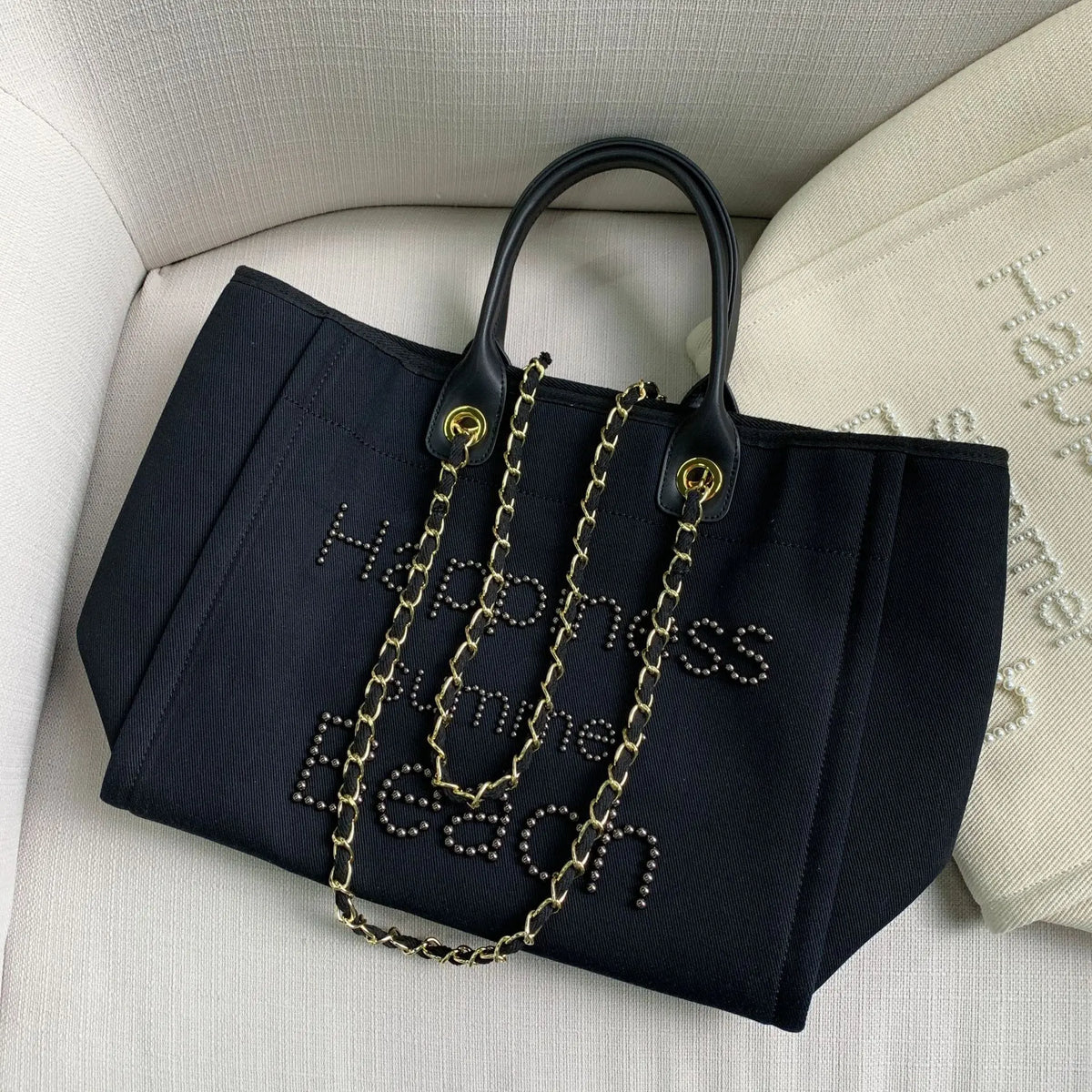 Large genuine leather and canvas shoulder bag for women by Corporación Turística, stylish and spacious for everyday use.
