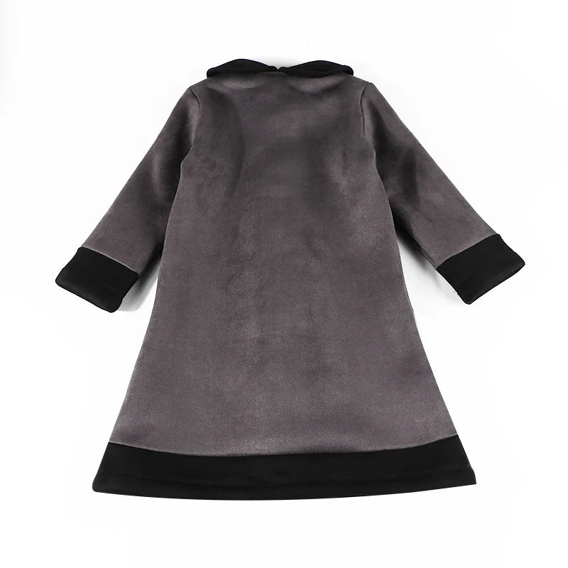 Elegant children's winter coat by Corporación Turística, featuring a stylish design and warm fabric for kids' cold weather.