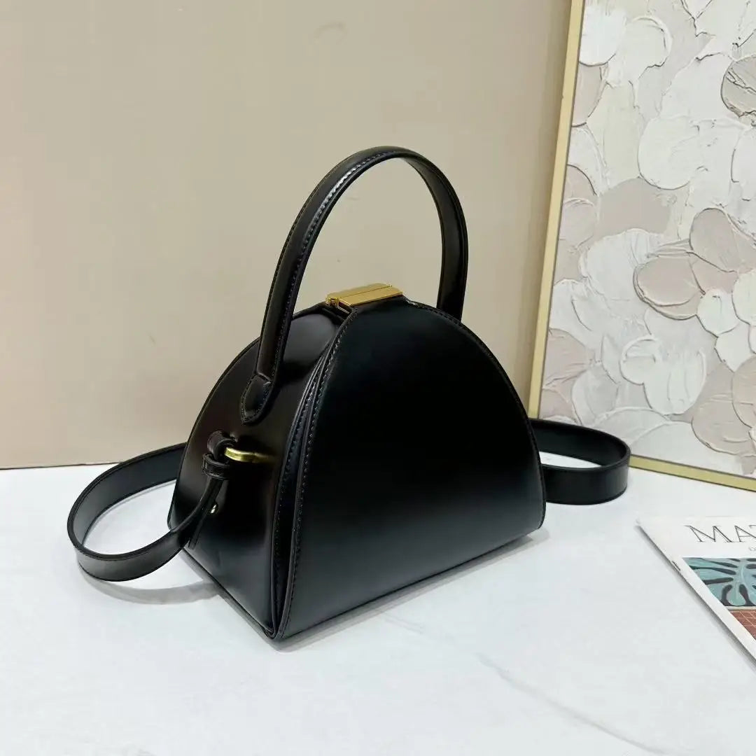 Gold PU shoulder bag for women with niche design, from Corporación Turística, featuring a stylish and functional accessory.