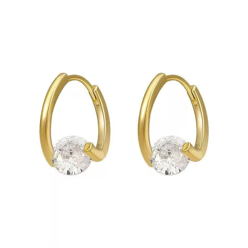 Gold and white Korean fashion zircon pendant earrings with elegant dangling design for women.