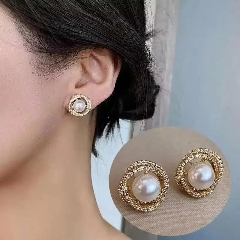 Gold and white Korean fashion zircon pendant earrings with dangling design, stylish jewelry for women.