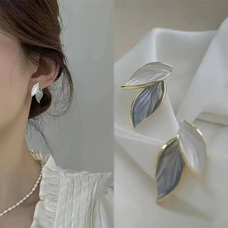 Gold and white Korean fashion zircon dangling earrings with intricate design, perfect for stylish women.