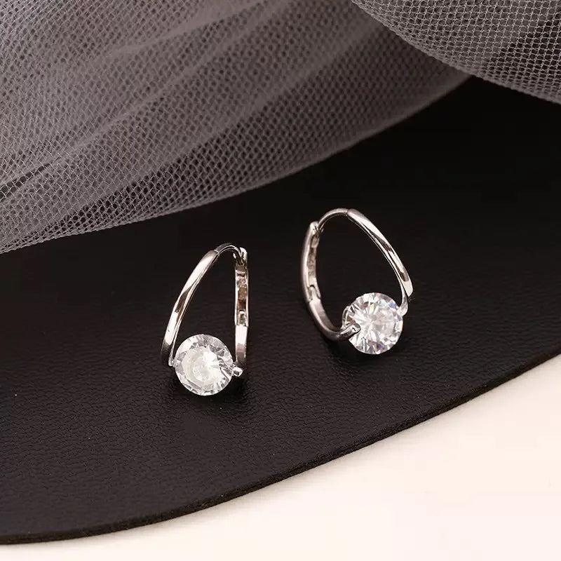 Gold and white Korean fashion zircon pendant earrings featuring elegant hanging design for women.
