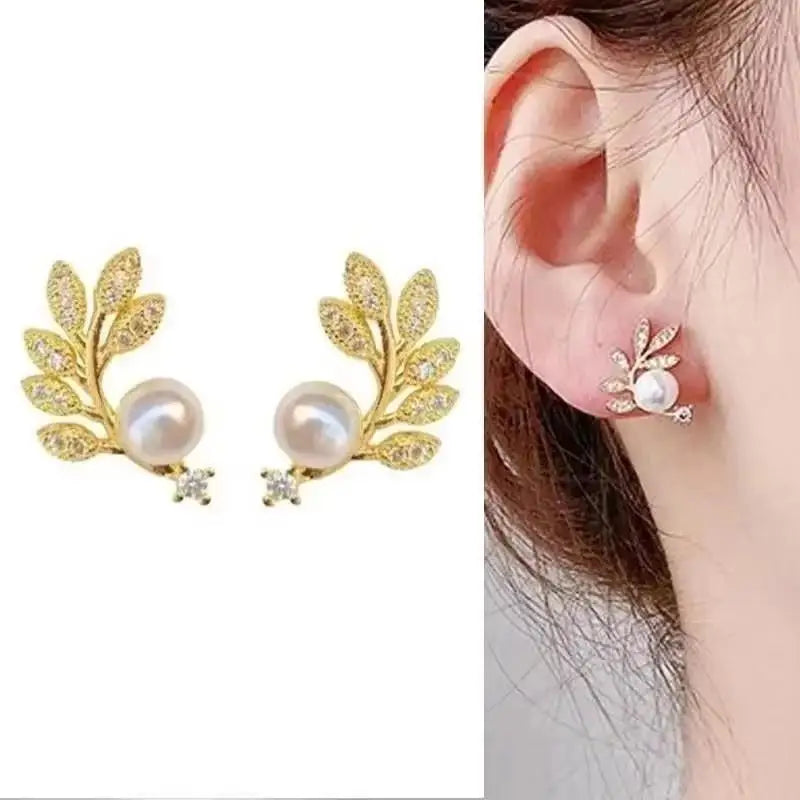 Gold and white Korean fashion zircon dangling earrings featuring intricate designs for women.