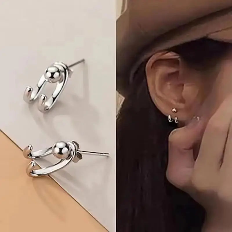Gold and white Korean fashion zircon pendant earrings with dangling design, stylish jewelry for women.