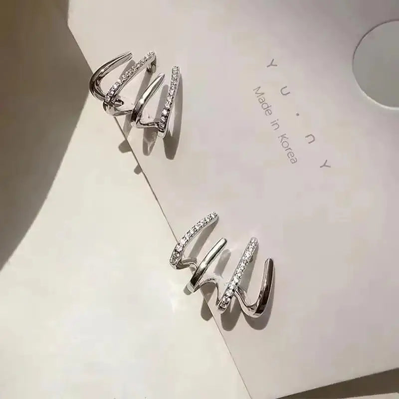Gold and white Korean fashion zircon dangling earrings featuring intricate design, ideal for stylish women's accessories.