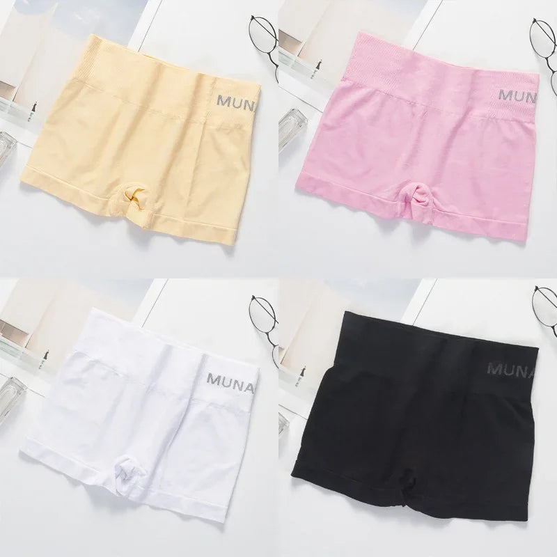 Pack of four gray women's fitted safety shorts from Corporación Turística, designed for secure fit and comfort.