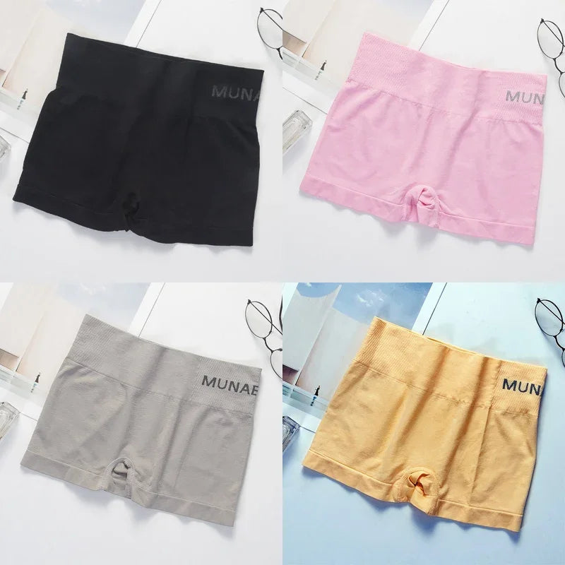 Set of four gray women's fitted safety shorts from Corporación Turística, designed for secure fit and comfort.