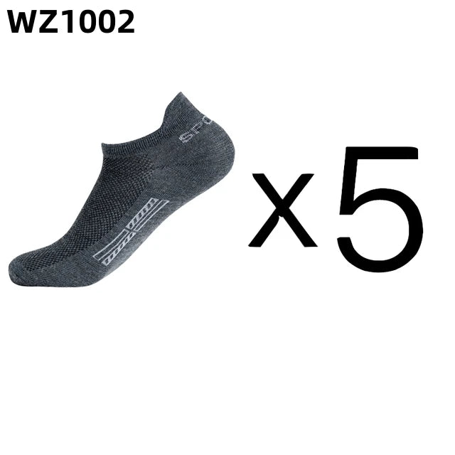 Set of five high-quality gray ankle socks for men by Corporación Turística, shown stacked with folded edges and soft fabric texture.