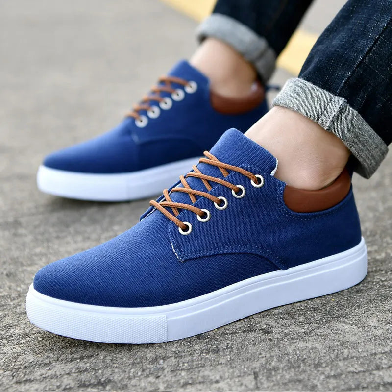 Light gray Feerldi men's casual shoes by Corporación Turística, featuring a comfortable slip-on design with breathable material.