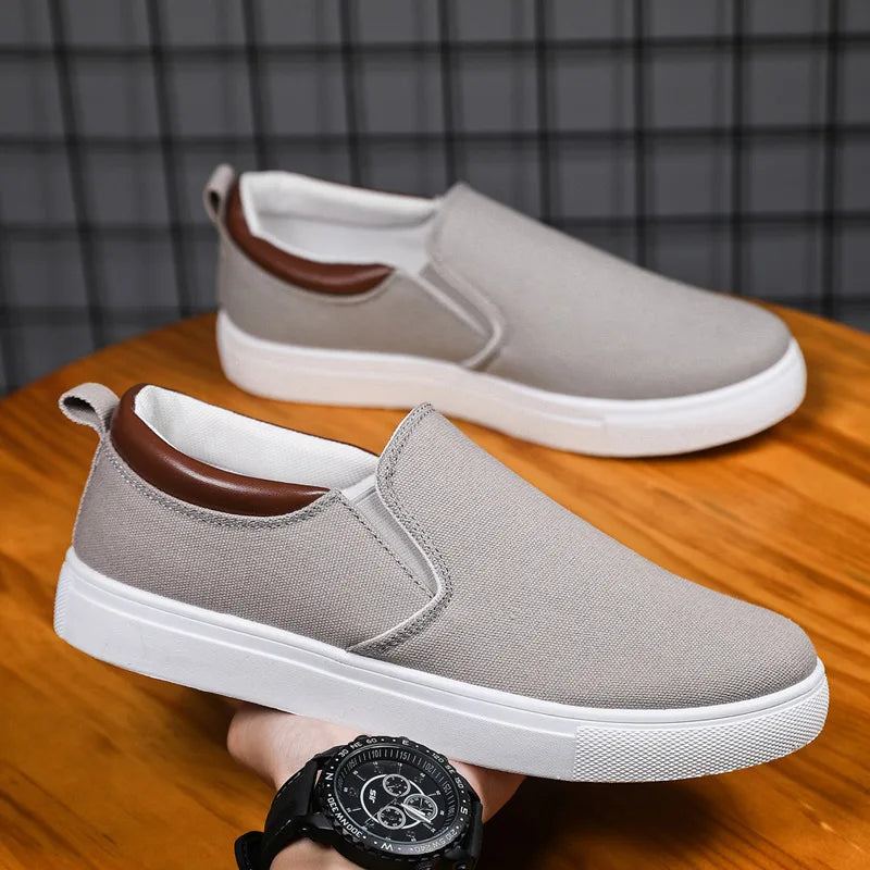 Gray Feerldi men's casual lightweight shoes by Corporación Turística, showing the comfortable slip-on sneaker design.