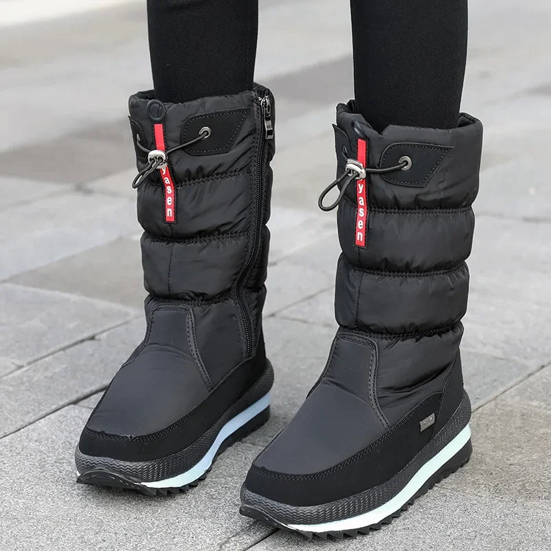 Gray women's fashionable warm snow boots by Corporación Turística, featuring a sturdy design suitable for winter conditions.