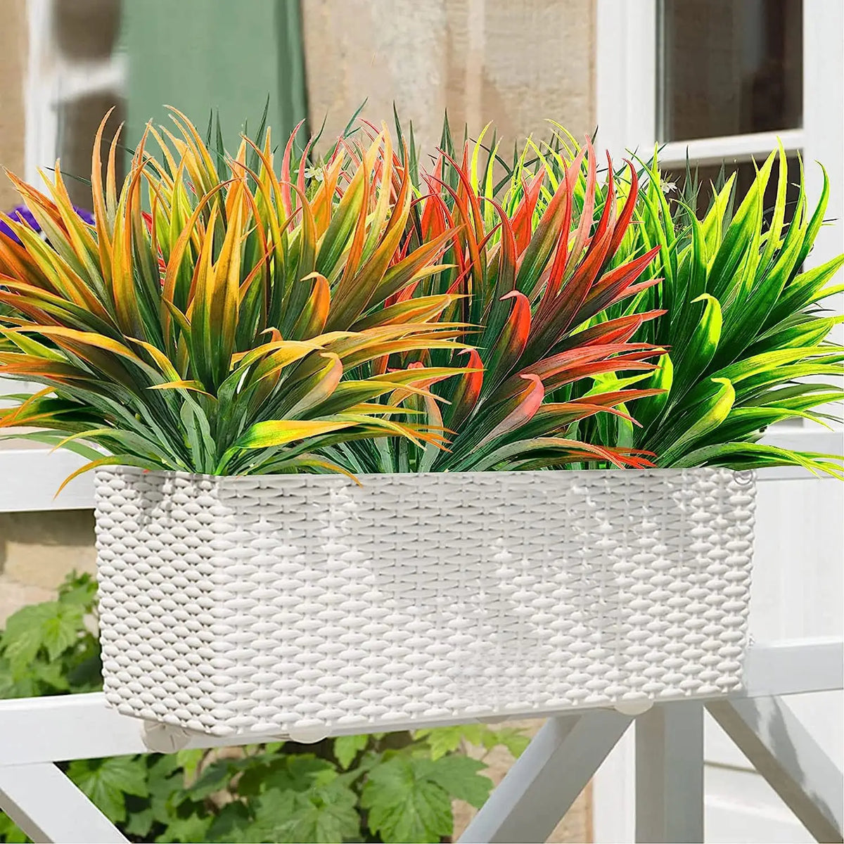 Spring grass garland from Corporación Turística, decorative green natural-looking floral string for home decor.